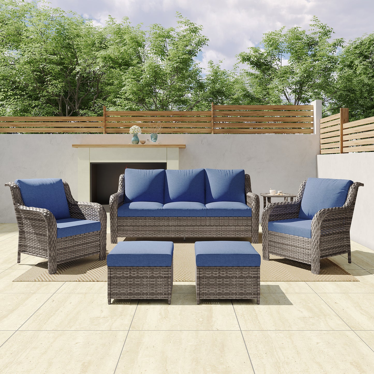 JB A three-seater sofa + two armchairs + two footstools