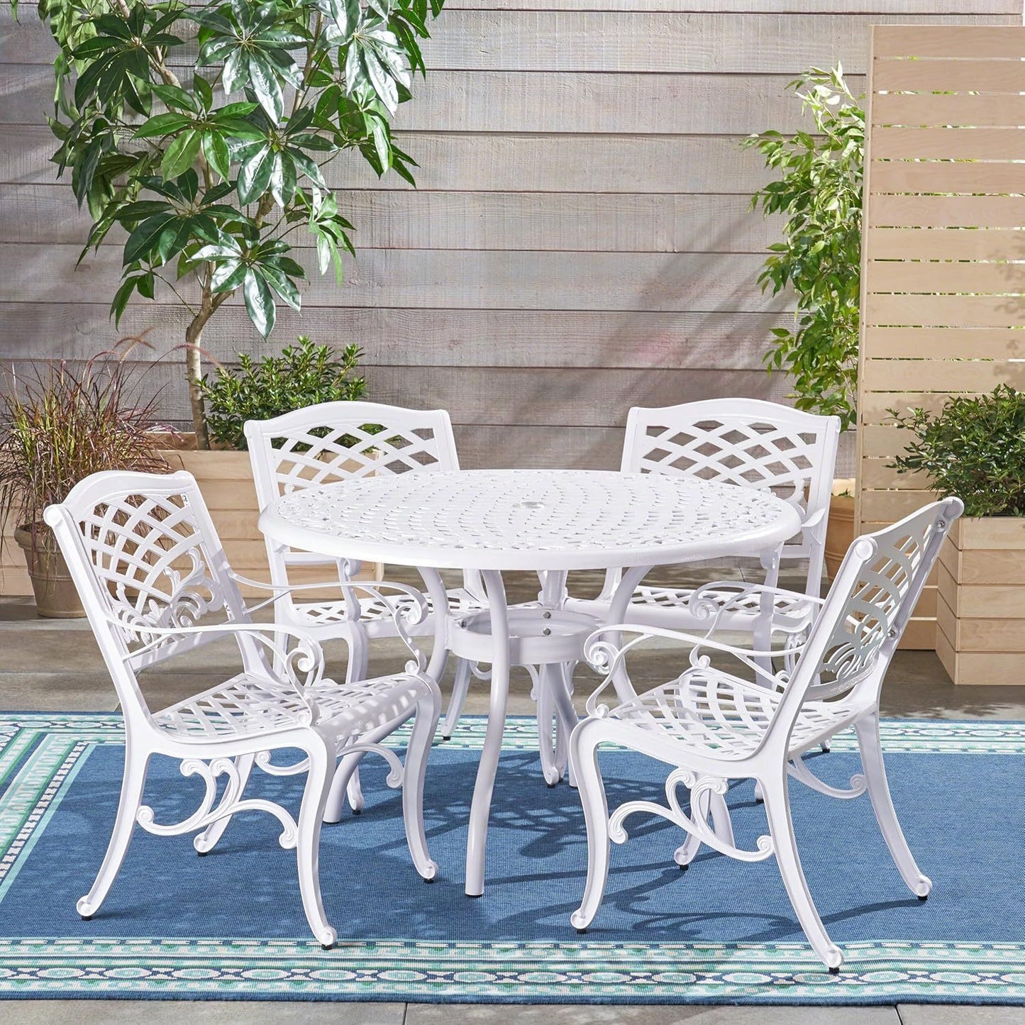 Dieter 4 - Person Metal Patio Dining Set with Round Table